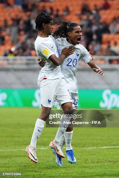 Mathis Amougou of France celebrates with Tidiane Diallo after scoring the team's first goal during the Group E match between France and Korea...