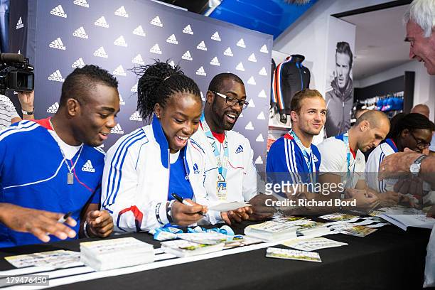 Members of the French National Judo Team, Dimitri Dragin, Gevrise Emane, Teddy Riner, Ugo Legrand, Alain Schmitt and Emilie Andeol attend a signing...