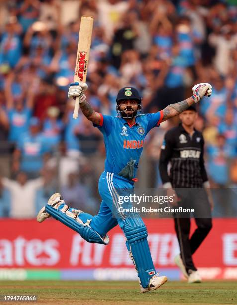 Virat Kohli of India celebrates after scoring a century, overtaking Sachin Tendulkar for the all time most ODI centuries during the ICC Men's Cricket...