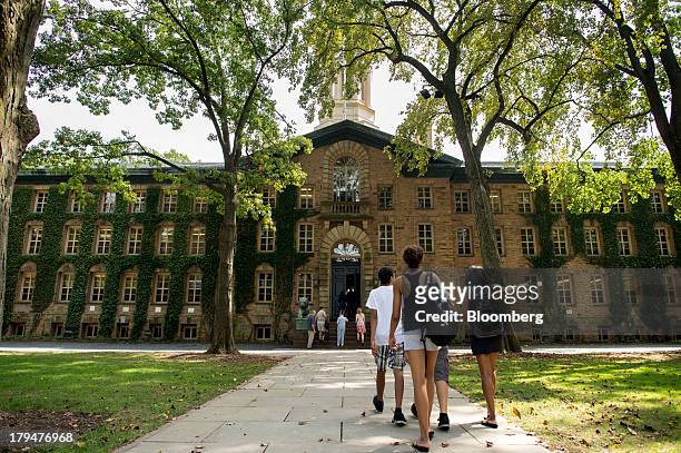 People walk on the Princeton University campus in Princeton, New Jersey, U.S., on Friday, Aug. 30, 2013. Residents in Princeton, New Jersey, have...