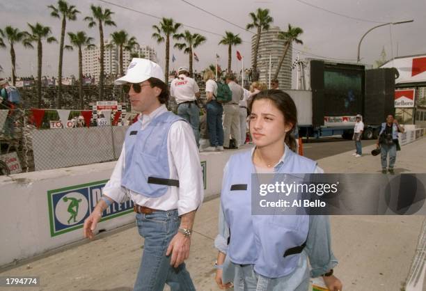 Actor Jerry Seinfeld and Shoshana Loenstein walk during the Long Beach Grand Prix in Long Beach, California. Mandatory Credit: Al Bello /Allsport