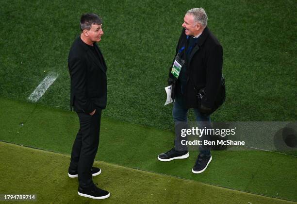 Dublin , Ireland - 21 November 2023; Republic of Ireland manager Stephen Kenny, left in conversation with former Republic of Ireland player and...