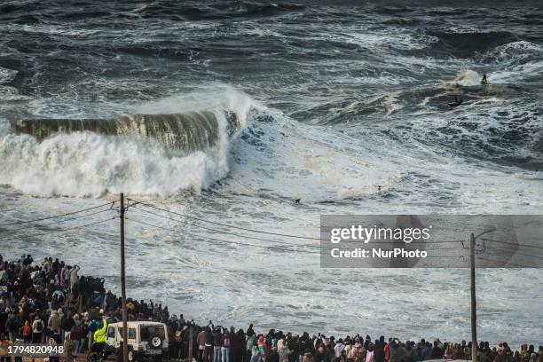 Hundreds of spectators are gathering at the Nazare lighthouse in Nazare, Portugal, on November 5 to take advantage of the forecasted giant waves....