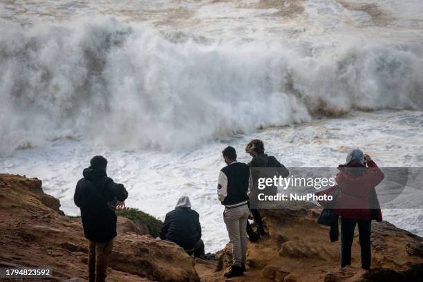 Hundreds of spectators are gathering at the Nazare lighthouse in Nazare, Portugal, on November 5 to take advantage of the forecasted giant waves....