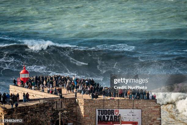 Hundreds of spectators are gathering at the Nazare lighthouse in Nazare, Portugal, on November 5 to take advantage of the forecasted giant waves....