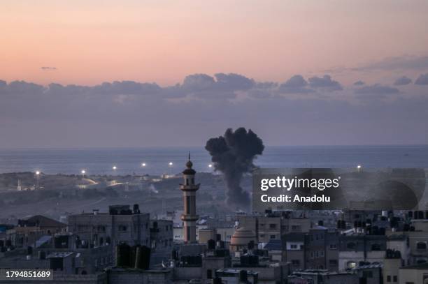 Smoke rises as the Israeli attacks continue on its 46th day in Rafah, Gaza on November 21, 2023.