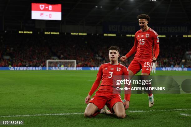 Wales' defender Neco Williams celebrates after scoring his team first goal during the UEFA Euro 2024 Group D qualifying football match between Wales...