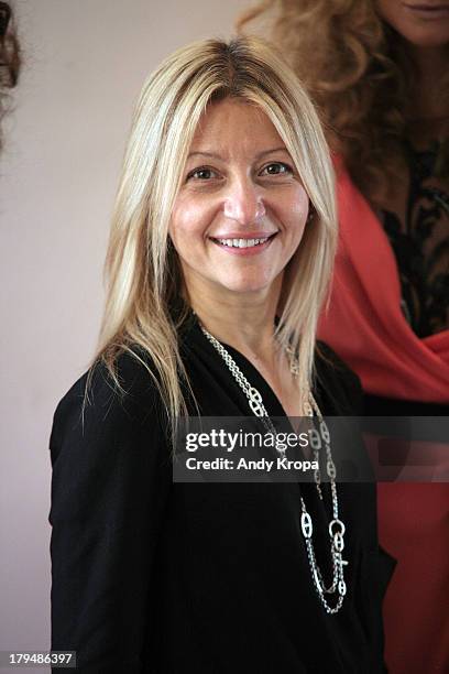 Fashion designer Rita Vinieris attends the Rita Vinieris Debut Collection presentation during Mercedes-Benz Fashion Week Spring 2014 at The London...