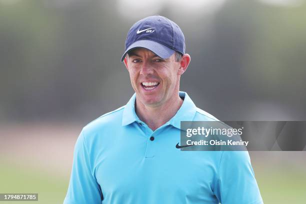 Rory McIlroy of Northern Ireland laughs on the 18th green during a practice round prior to the DP World Tour Championship on the Earth Course at...