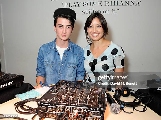 Daisy Lowe and brother Alfie Goffey DJ at the launch of Alexa Chung's first book "It" at Liberty on September 4, 2013 in London, England.