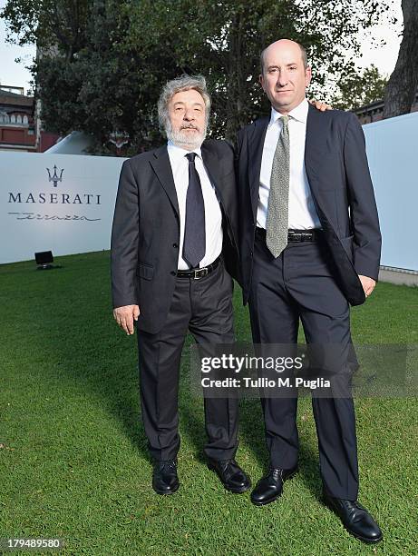 Director Gianni Amelio and actor Antonio Albanese attend the 70th Venice International Film Festival at Terrazza Maserati on September 4, 2013 in...