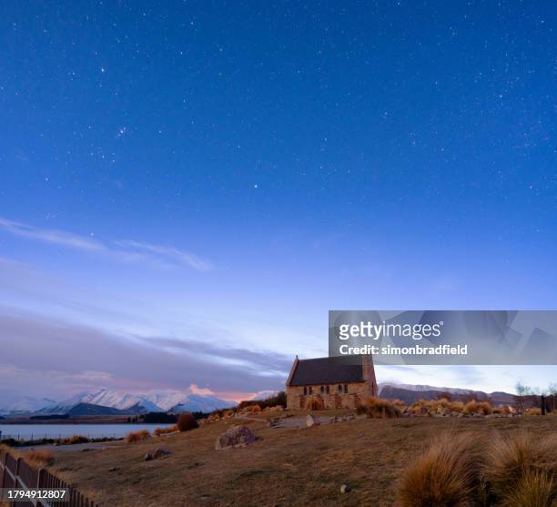 milky way over the church of the good shepherd, new zealand - simonbradfield stock pictures, royalty-free photos & images