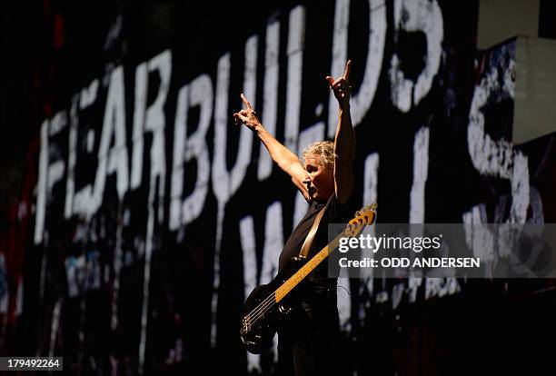 British musician and founding member of Pink Floyd, Roger Waters performs on stage during his "The Wall" show at the Olympic stadium in Berlin on...