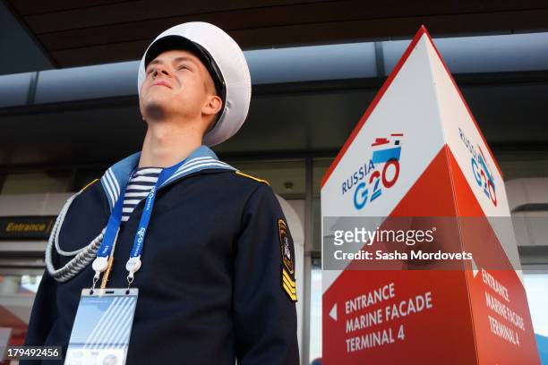 Russian sailor stands on guard near the Sea Port ahead of the G20 summit on September 4, 2013 in St. Petersburg, Russia. The G20 summit is scheduled...