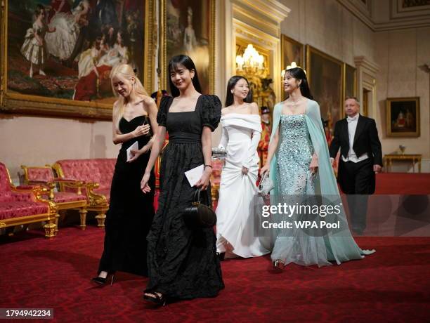 Jisoo, Jennie, Rosé and Lisa, members of South Korean girl band Blackpink attend the State Banquet at Buckingham Palace on November 21, 2023 in...