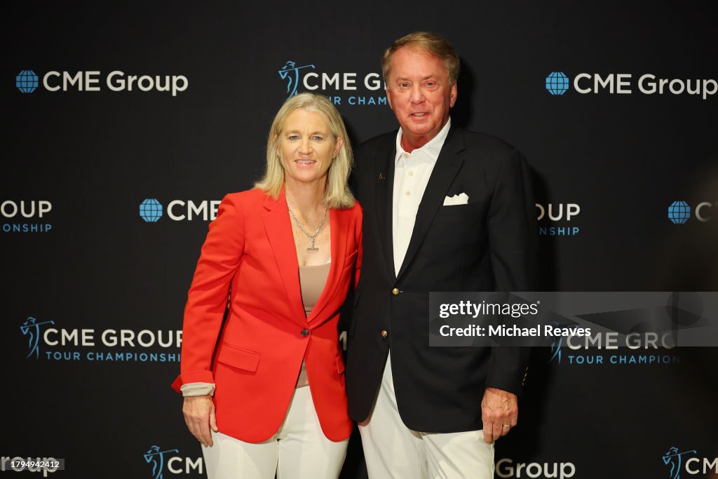 Mike Marcoux Commissioner Mollie Marcoux Samaan poses with CME Group CEO Terry ...
