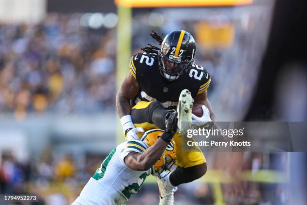 Najee Harris of the Pittsburgh Steelers runs the ball during an NFL football game against the Green Bay Packers at Acrisure Stadium on November 12,...