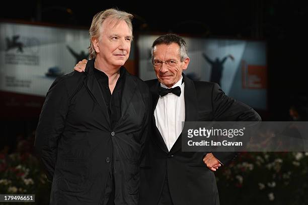 Actors Alan Rickman and director Patrice Leconte attend the 'Une Promesse' Premiere during the 70th Venice International Film Festival at Sala...