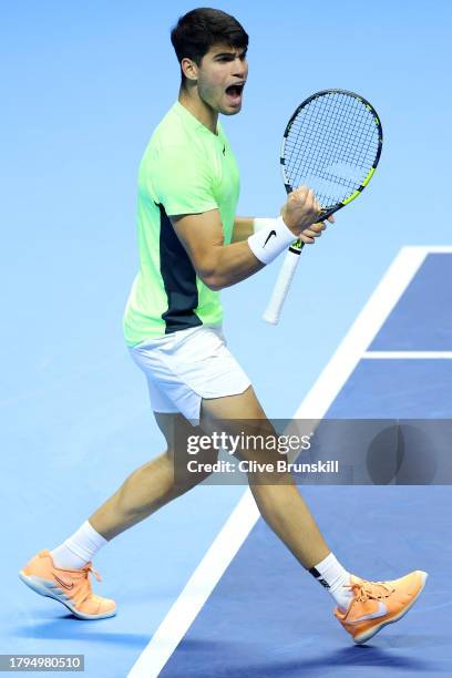 Carlos Alcaraz of Spain celebrates a point against Andrey Rublev during the Men's Singles Round Robin match on day four of the Nitto ATP Finals at...