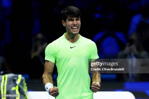 Carlos Alcaraz of Spain celebrates winning match point against Andrey Rublev during the Men's Singles Round Robin match on day four of the Nitto ATP...