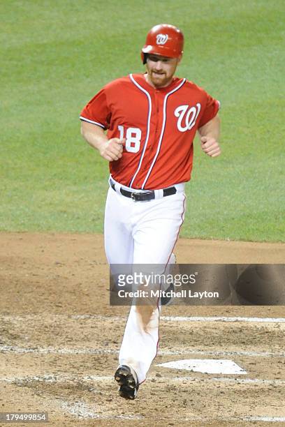Chad Tracy of the Washington Nationals scores a run during a baseball game against the Los Angeles Dodgers on July 20, 2013 at Nationals Park in...