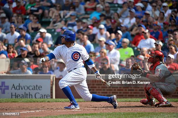 Darnell McDonald of the Chicago Cubs bats during the seventh inning against the Philadelphia Phillies at Wrigley Field on August 30, 2013 in Chicago,...