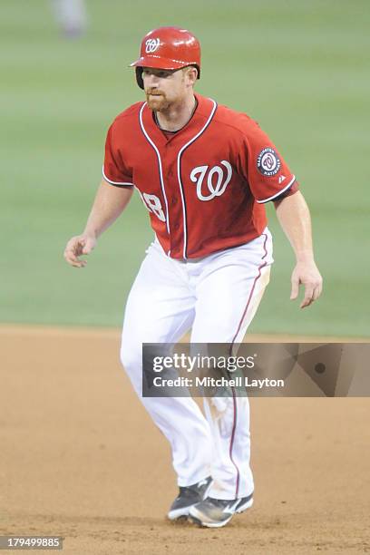 Chad Tracy of the Washington Nationals leads off first base during a baseball game against the Los Angeles Dodgers on July 20, 2013 at Nationals Park...