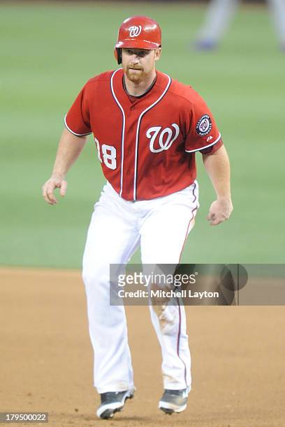 Chad Tracy of the Washington Nationals leads off first base during a baseball game against the Los Angeles Dodgers on July 20, 2013 at Nationals Park...