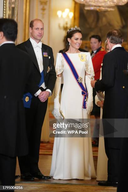 Prince William, Prince of Wales and Catherine, Princess of Wales attend the State Banquet at Buckingham Palace on November 21, 2023 in London,...