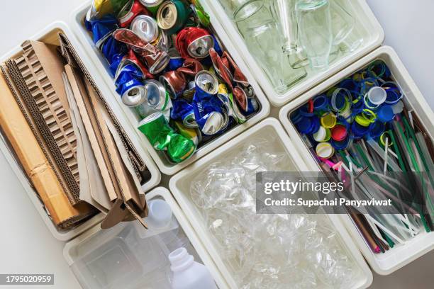 close-up recycled waste, sorting garbage by type to recycling - multiples stock pictures, royalty-free photos & images