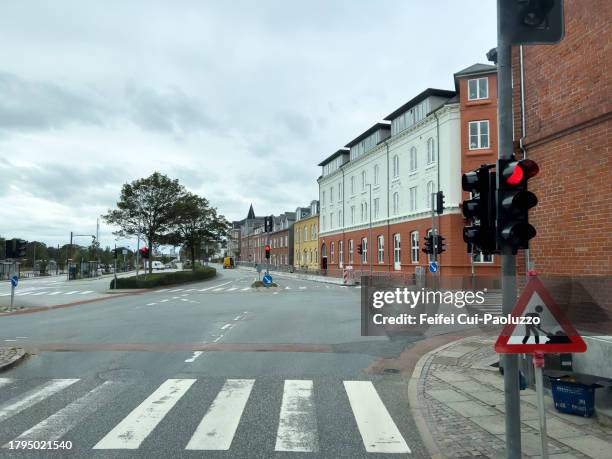 stop light and zebra crossing at downtown thisted - road signal stock pictures, royalty-free photos & images