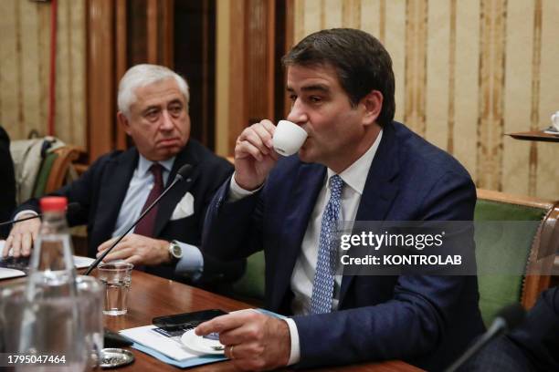 Raffaele Fitto, Minister for European Affairs, Cohesion Policies and the National Recovery and Resilience Plan, while drinking coffee, during a press...