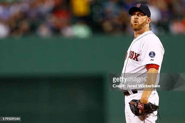Ryan Dempster of the Boston Red Sox pitches against the Detroit Tigers during the game on September 4, 2013 at Fenway Park in Boston, Massachusetts.