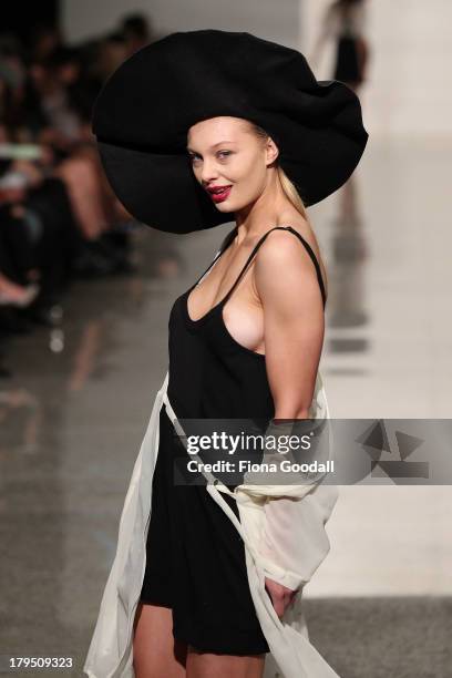 Model showcases designs by Love Hotel on the runway during the NZFD Designer Showcase show during New Zealand Fashion Week at the Viaduct Events...