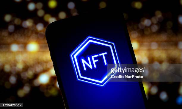 The NFT logo is seen in this illustrtion photo taken in Warsaw, Poland on 21 November, 2023.