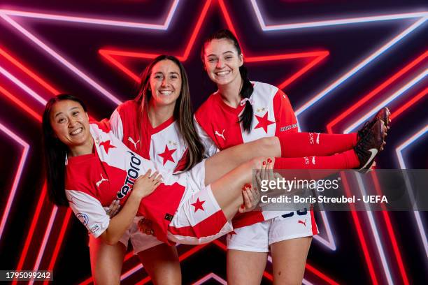 Michelle Xiangting Xiao, Haleigh Kae Stackpole and Molly Colleen McLaughlin pose for a portrait during the UEFA Women's Champions League Official...