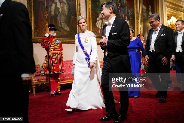 Britain's Sophie, Duchess of Edinburgh and South Korea's Deputy National Security Advisor Cho Taeyong arrive for a a State Banquet at Buckingham...