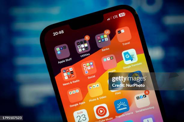 An iPhone home screen is seen with different applications in this illustrtion photo taken in Warsaw, Poland on 21 November, 2023.