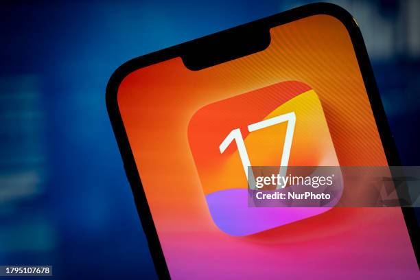 The iOS 17 logo opoerating system is seen on an iPhone in this illustrtion photo taken in Warsaw, Poland on 21 November, 2023.