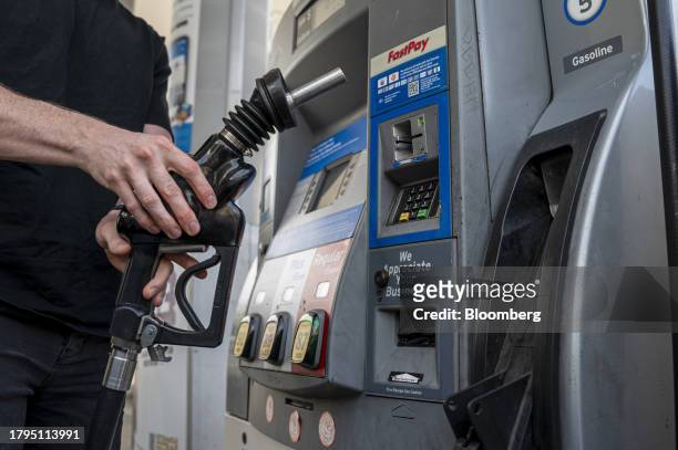 Customer refuels at a Chevron gas station in San Francisco, California, US, on Tuesday, Nov. 21, 2023. The US Thanksgiving travel period is shaping...