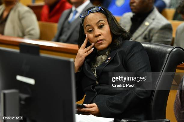 Fulton County District Attorney Fani Willis appears before Judge Scott McAfee for a hearing in the 2020 Georgia election interference case at the...