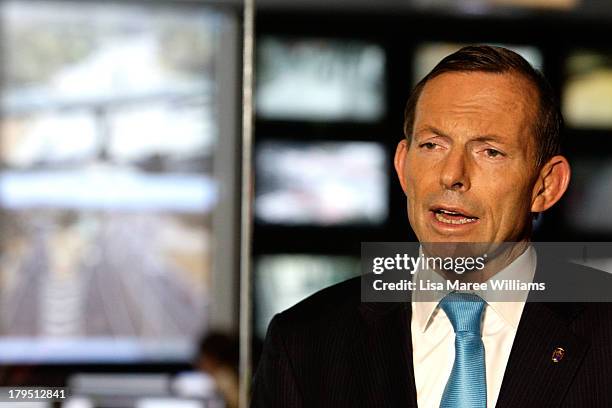 Australian Opposition Leader, Tony Abbott tours the Brisbane Metroplitan Transport Management Centre on September 5, 2013 in Brisbane, Australia....