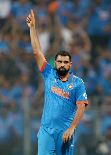 Mohammed Shami of India celebrates after dismissing Lockie Ferguson of New Zealand to win the ICC Men's Cricket World Cup India 2023 Semi Final match...