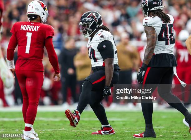 Albert Huggins of the Atlanta Falcons celebrates a stop near the line of scrimmage during the second quarter of a game against the Arizona Cardinals...
