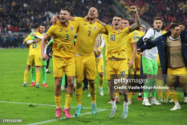 Radu Dragusin, Denis Alibec and Nicolae Stanciu of Romania celebrates the qualifying after the UEFA EURO 2024 European qualifier match between...