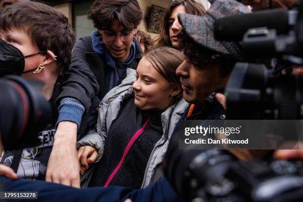 Swedish environmental activist Greta Thunberg leaves Westminster Magistrates Court after pleading not guilty to a public order offence on November...