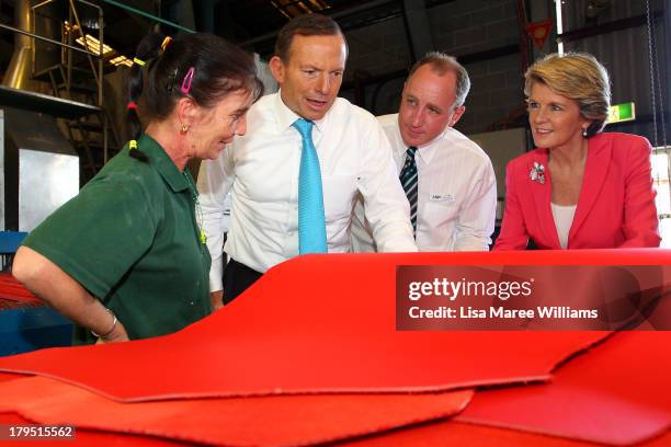 Australian Opposition Leader, Tony Abbott and Deputy Liberal Leader Julie Bishop tour Packer Leather on September 5, 2013 in Brisbane, Australia. The...