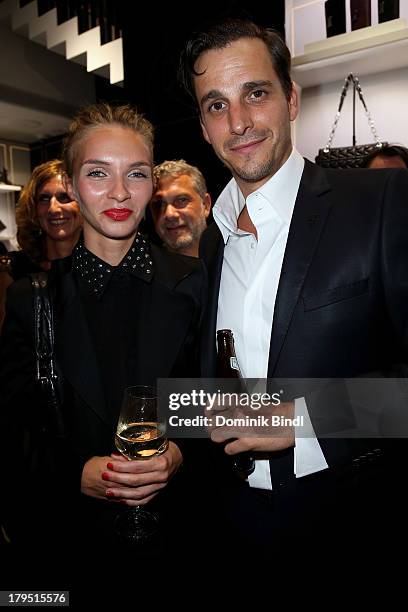 Kim Eberle and Max von Thun Hohenstein attend the Karl Lagerfeld store opening on September 4, 2013 in Munich, Germany.