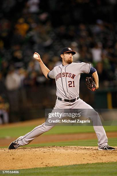 Philip Humber of the Houston Astros pitches during the game against the Oakland Athletics at O.co Coliseum on August 14, 2013 in Oakland, California....