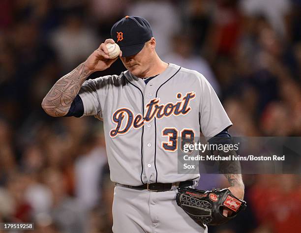 Jeremy Bonderman of the Detroit Tigers reacts after allowing a double to Will Middlebrooks of the Boston Red Sox during the seventh inning on...